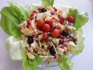 Waldorf Salad with interesting twist served onbthe bed of salad leaves