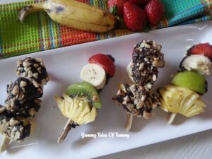 Fruity and Nutty Sticks ready with chocolate coating and peanuts garnish