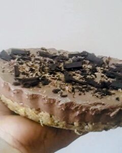 Coconut crust coffee mousse pie side view shot