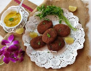 Beetroot Cutlet | Bengali Vegetable Chop served in white platter with dipping sauce on the side