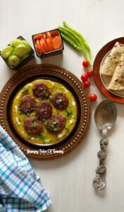 Jackfruit shahi kofta curry served with roti and salad on the side 