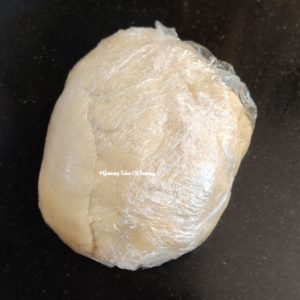 Dough wrapped in cling film