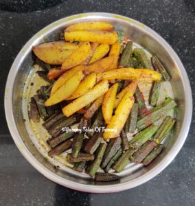Stir fried bhindi Alu on a steel plate