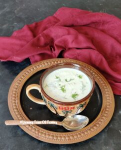 Best Tzatziki dip recipe | Tzatziki Recipe served in big brown mug with spoon on the side