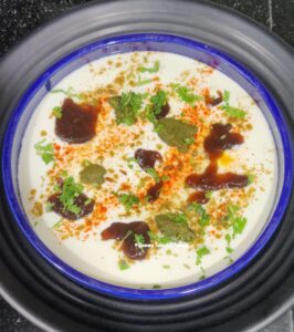 Whisked curd topped with chutneys