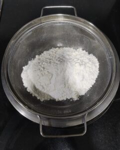 Sieved dry ingredients to make cake