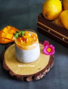 Vegan Mango coconut chia seed pudding served in a glass