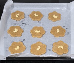 Ready to be baked cookies laid on parchment paper 