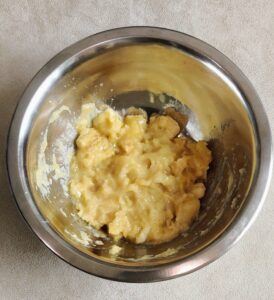 Mashed ripe banana in a bowl