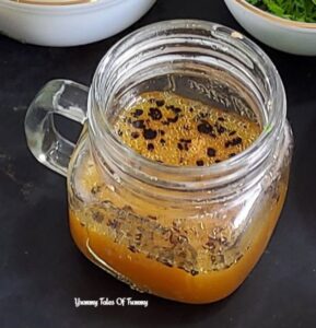 Simple salad dressing ready to be poured over 