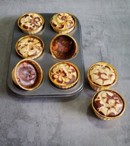 Easy Chocolate Marble Muffins (eggless) ready to be consumed