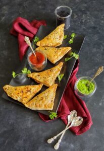 Puff pastry Samosa (Air fryer method) served with green chutney and tomato sauce 
