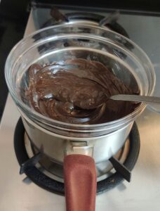 Melting the chocolate using double boiler method 