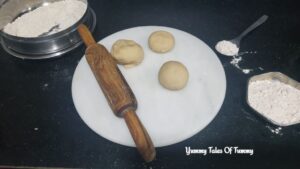 Dough balls ready to be rolled for How to make Soft Roti (Chapati)