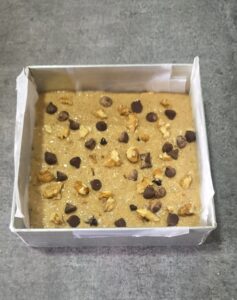 Air fryer Banana Oats Cake (eggless) batter poured in baking tin