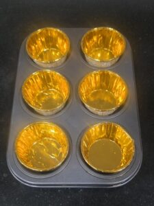 Muffin molds placed in a muffin tray