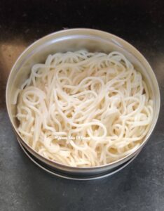 Cooked spaghetti pasta in a bowl