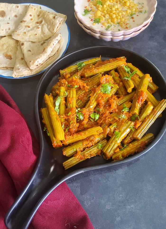 You are currently viewing Moringa Tomato curry Recipe | Singyun ji Bhaji