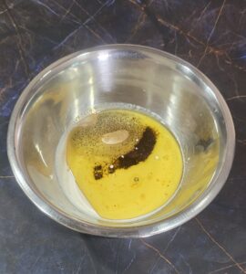 Wet ingredients in a steel bowl