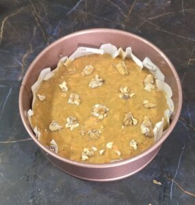 Cake batter in a baking pan ready to be baked