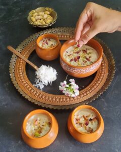 Nariyal ki Kheer | Coconut Pudding served in glass bowls garnished with dry rose petals